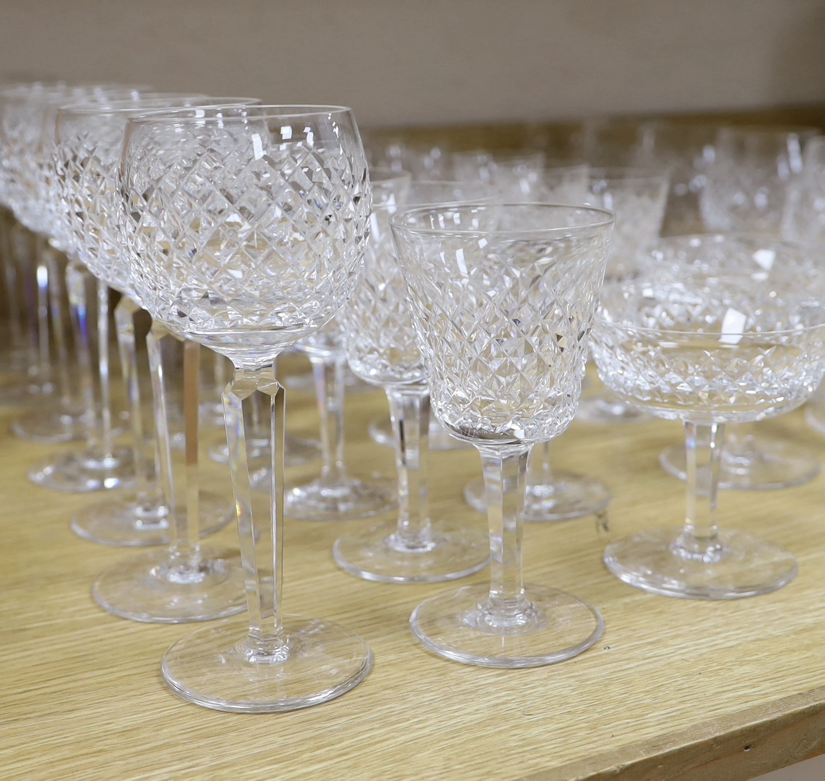 A part suite of Waterford drinking glassware, including champagne glasses, brandy glasses, liquor glasses, wine glasses, etc (61)